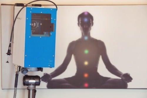 This is Aura reveals spiritual evolution photographing equipment. Also presented are the energy centres or chakras of the body with their associated colours.